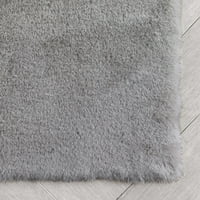 Добро ткаени опалски сртот текстура цврсто сиво модерно крзно од фау 31 килим на срцева област